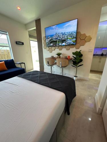 Postel nebo postele na pokoji v ubytování Tropical Studio