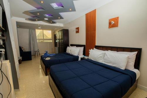 Postel nebo postele na pokoji v ubytování Horus Guest House Pyramids
