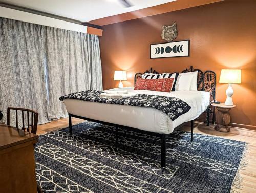 a bedroom with a large bed in a room at The Tiki Suite 2BR 2BA in Columbia