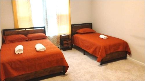 Postel nebo postele na pokoji v ubytování Game Day Touchdown Lounge in Baton Rouge - CB1024