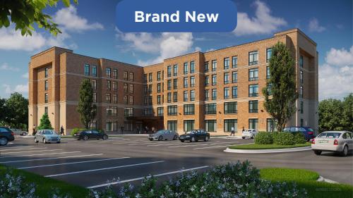 a rendering of a building with cars parked in a parking lot at TownePlace Suites by Marriott Memphis Germantown in Memphis