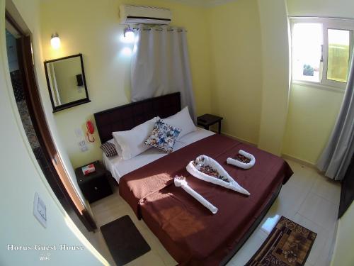 Letto o letti in una camera di Horus Guest House Pyramids