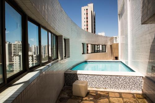 Πισίνα στο ή κοντά στο Localização Espetacular - Zona Norte - Sem Taxas