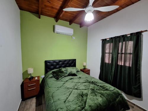 Ένα ή περισσότερα κρεβάτια σε δωμάτιο στο Cabañas Sol del Valle Fiambalá