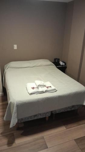 Hotel Alto Paranaにあるベッド