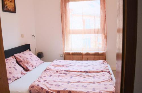 Postel nebo postele na pokoji v ubytování 4N Appartement