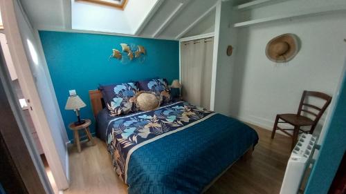 Katil atau katil-katil dalam bilik di Le Cottage Exotique du Lutin Many & son bain nordique