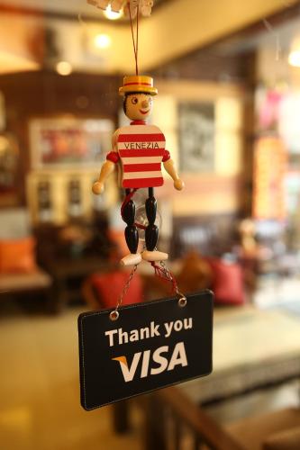 a sign that says thank you vista hanging from a string at Pro Andaman Place in Karon Beach