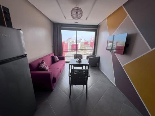 Posezení v ubytování Appartement No 6 vue sur mer au loin