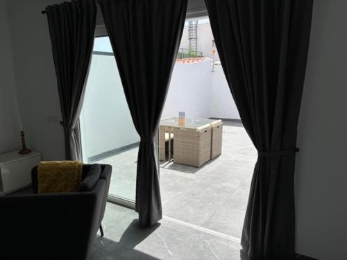 Coin salon dans l'établissement Apartamentos La Caracola El Médano