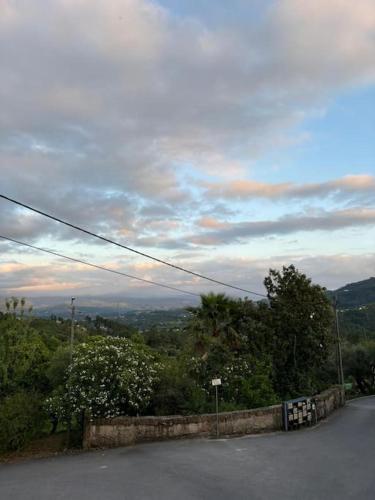 a view of a road with a cloudy sky at Casa das Oliveiras in Celorico de Basto