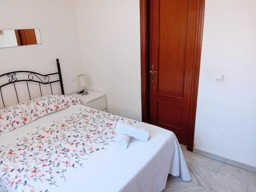 A bed or beds in a room at Apartamento Sostoa 1