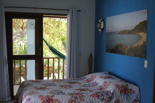 Postel nebo postele na pokoji v ubytování Pipa Hawaii Suites