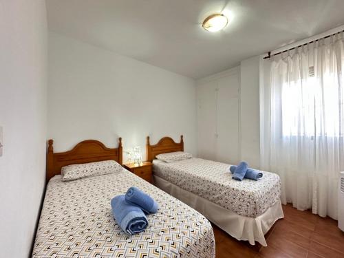 Posteľ alebo postele v izbe v ubytovaní Mare Nostrum Beach El Palo Vistas al Mar Terraza ,Aparcamiento