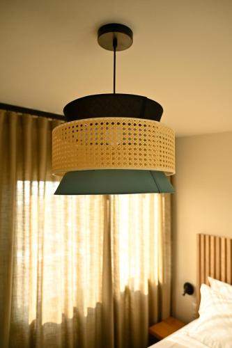 Una cama o camas en una habitación de Montamar Olympus Villas
