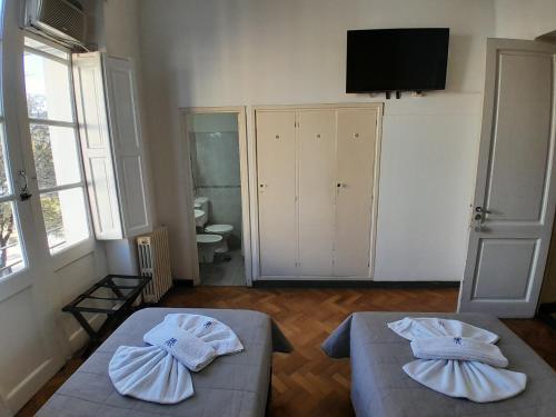 TV a/nebo společenská místnost v ubytování Hotel Plaza