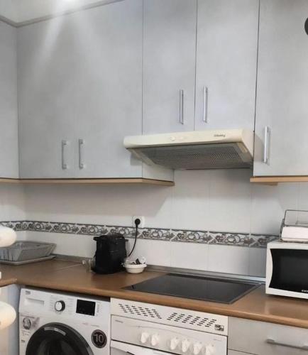 Apartamentos CH3 parking incluidoにあるキッチンまたは簡易キッチン