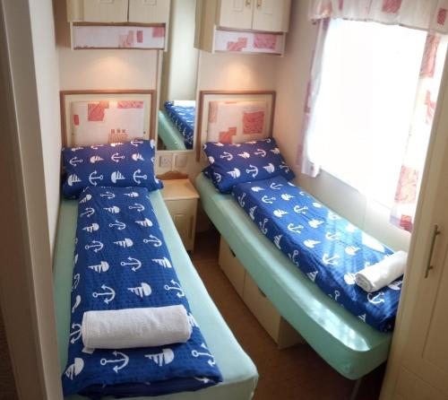 Postel nebo postele na pokoji v ubytování Mobilheim Žabčice
