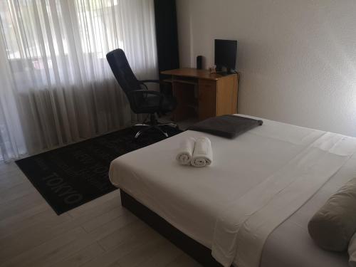 Postel nebo postele na pokoji v ubytování Apartman Providenca
