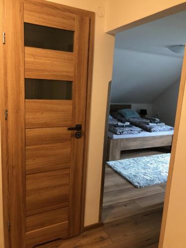 Postel nebo postele na pokoji v ubytování Na Rozcestí Frýdlant