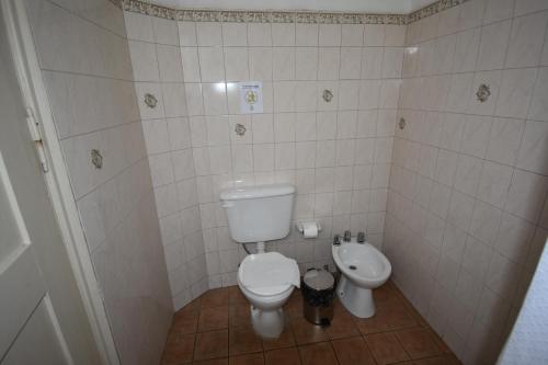 Koupelna v ubytování Hotel Plaza