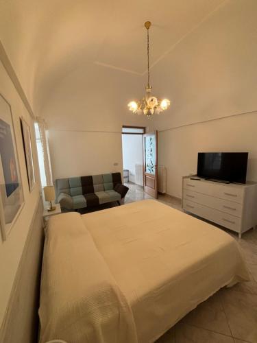 Una cama o camas en una habitación de Il Rifugio nel Vicolo