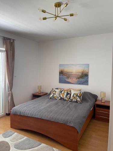 a bedroom with a bed with a ceiling at Rab Island Apartmets - Palit in Rab