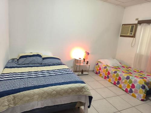 Postel nebo postele na pokoji v ubytování LA CASA DE DON MATILDE