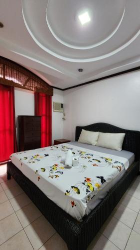 Ένα ή περισσότερα κρεβάτια σε δωμάτιο στο EV2 Townhouse Hotel