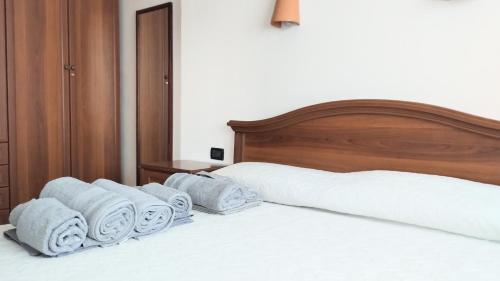 Letto o letti in una camera di Villa Raffaello