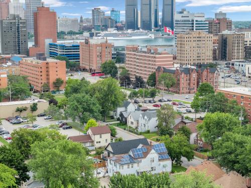 an aerial view of a city with tall buildings at Stylish 2-Bedroom Apartment In Downtown Windsor in Windsor