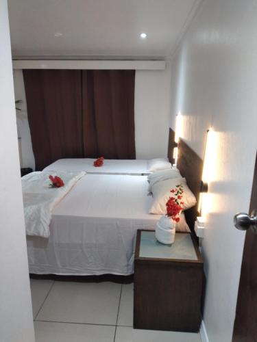 Ένα ή περισσότερα κρεβάτια σε δωμάτιο στο Nadi Airport Transit Hotel