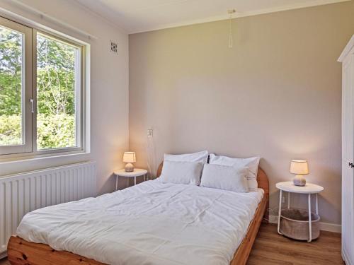 Ένα ή περισσότερα κρεβάτια σε δωμάτιο στο Holiday Home in Biggekerke near Seabeach