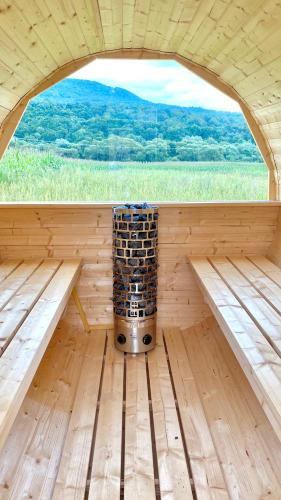 an inside view of a sauna with an open window at Rusínska chyža in Ulič