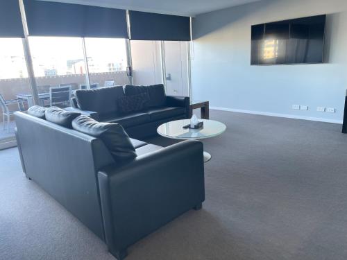 Honeysuckle Executive Apartmentsにあるテレビまたはエンターテインメントセンター