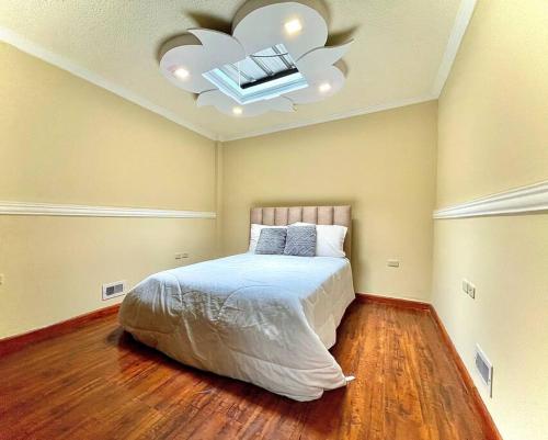 Llit o llits en una habitació de Cerca de ToDo !