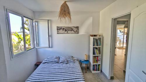 Postel nebo postele na pokoji v ubytování Ô coin des baleines