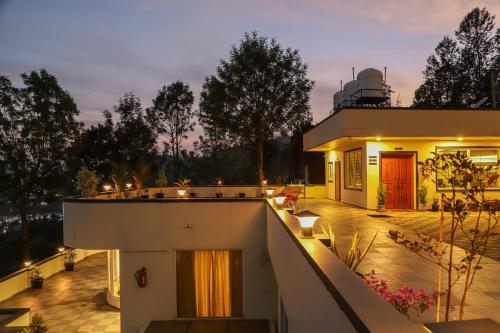 a view of a house with a balcony at De Borgo Hotel Ladakh by LexStays in Leh