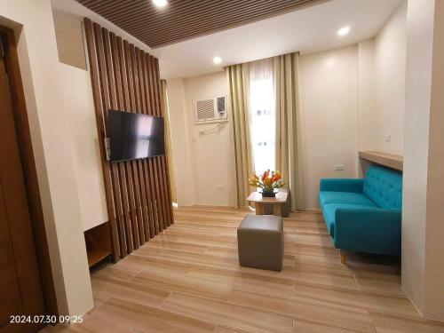 TV a/nebo společenská místnost v ubytování MDM Town Hotel