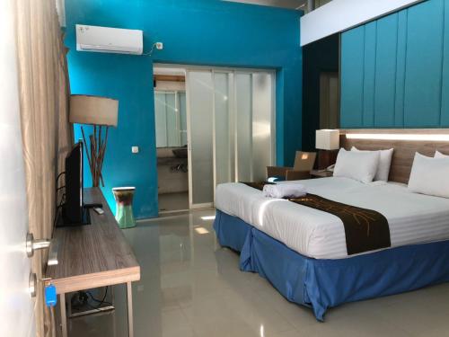 Ένα ή περισσότερα κρεβάτια σε δωμάτιο στο 2 BR Bougenville Villa