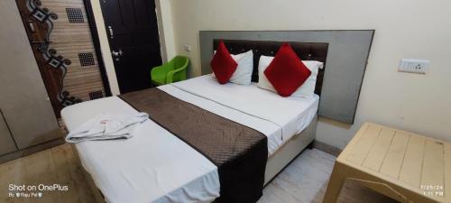 Ένα ή περισσότερα κρεβάτια σε δωμάτιο στο Hotel Prime Stay