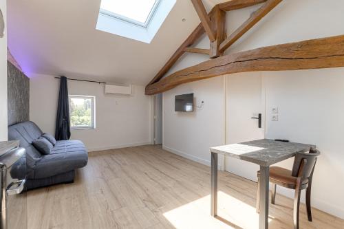 Posezení v ubytování Le Düsseldorf - Les appartements de l'olivier