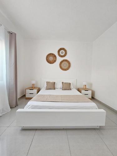 Кровать или кровати в номере La Isla villa - Grand Baie Piscine privée