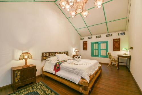 Letto o letti in una camera di Ohana House HQ