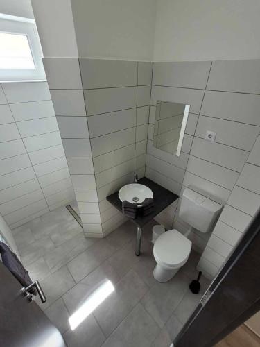 Salle de bains dans l'établissement Vecsési Rendezvényközpont és Panzió