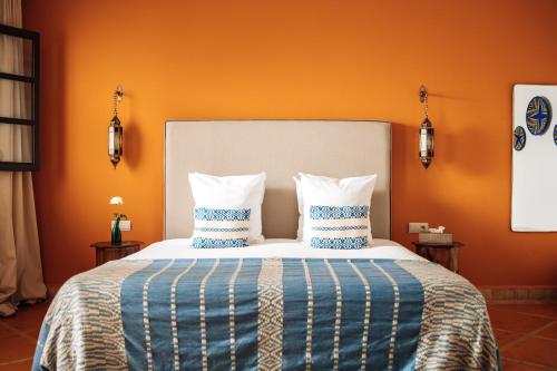 Voodi või voodid majutusasutuse Riad Deha & Spa toas