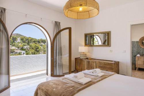 Postel nebo postele na pokoji v ubytování Villa Pakatoa