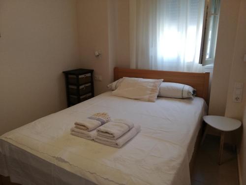 Una cama o camas en una habitación de EFThea Valley