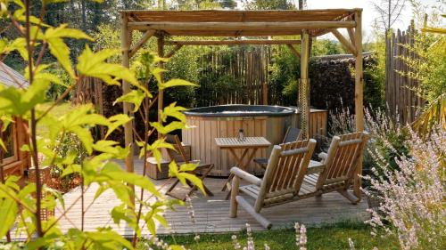 Photo de la galerie de l'établissement Cabane Spa belle étoile, à Soulaures