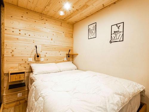 Postel nebo postele na pokoji v ubytování Charmant appartement 4 pers. 40m², style montagne moderne, proche commodités aux Belleville - FR-1-545-47